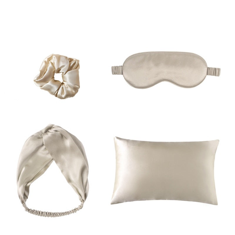 What's in the bag: satin pillowcase, eye mask, scrunchie and twist headband in champagne
