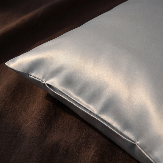 Envelope closure macro detail, silver satin pillowcase